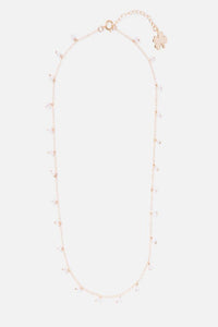 gold sprinkled necklace with clover